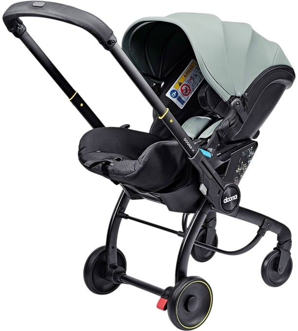 ������� ����� �� ���� � ���� Doona X i-Size - �� 40 �� 85 cm, � �������� �� ���������� � ��������� �� ������� - ������ �� ����